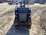 Back of new Mini Skid Steer,Side of new Boxer,New Boxer Mini Skid Steer in yard